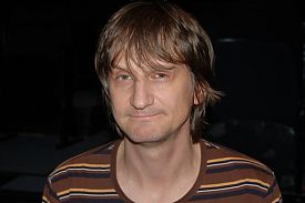 Lakomec